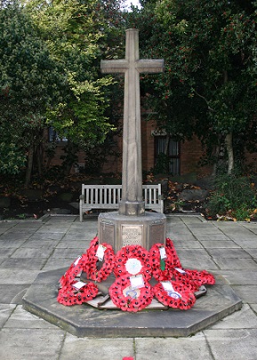 memorial with poppy wreaths 2014